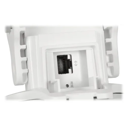 Zbliżenie na biały plastikowy panel z gniazdem Ethernet i przyciskiem resetowania. Panel jest częścią urządzenia elektronicznego, prawdopodobnie routera lub punktu dostępowego.