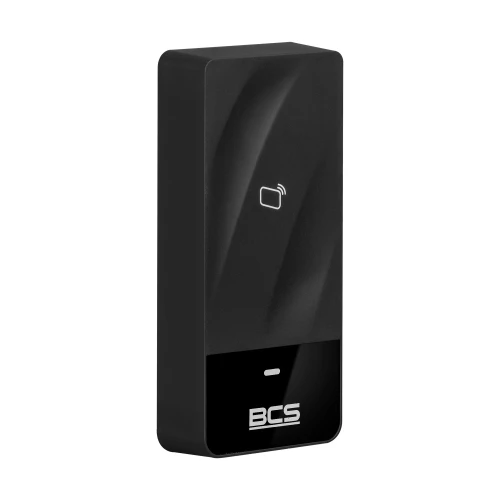 Czarny, prostokątny czytnik RFID z logo BCS na dole i ikoną karty zbliżeniowej na górze. Urządzenie ma nowoczesny design z lekko zaokrąglonymi krawędziami.