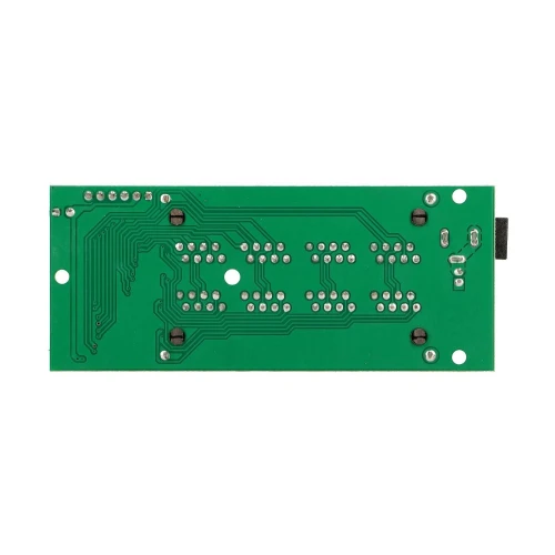 Zielona płytka drukowana z widocznymi ścieżkami i punktami lutowniczymi. Płytka ma prostokątny kształt i kilka otworów montażowych.
