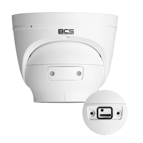 Biała, kopułowa kamera IP marki BCS z widocznymi złączami na spodzie obudowy. Kamera ma nowoczesny design i jest przeznaczona do monitoringu wizyjnego.
