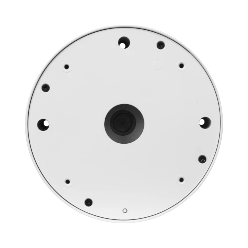 Na zdjęciu znajduje się okrągła, biała puszka montażowa do kamer z kilkoma otworami na śruby. W centralnej części widoczny jest czarny element, prawdopodobnie miejsce na montaż kamery.