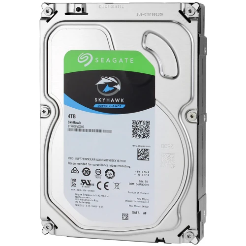 Na zdjęciu znajduje się system pomiaru temperatury ludzkiego ciała z wykorzystaniem kamery termowizyjnej BCS, zamontowany na statywie. W tle widoczny jest ekran wyświetlający obraz termowizyjny z zaznaczonymi temperaturami.